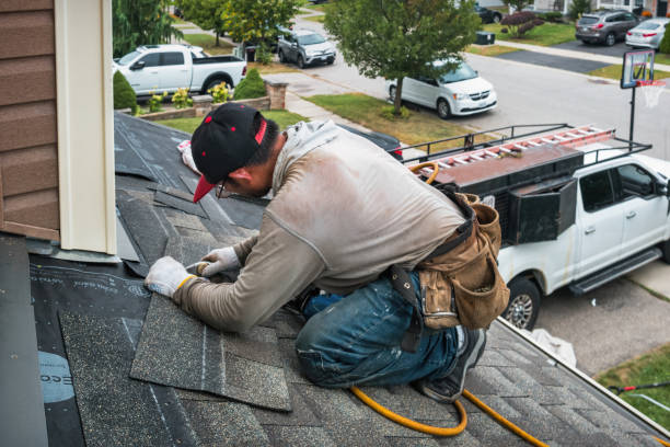 Professional Gutter Repair And Installation technician working in Bradford, IA